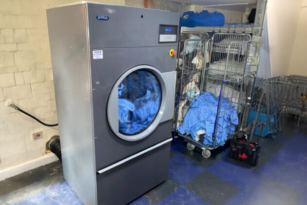 A commercial washing machine and tumble dryer
